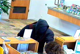 Local authorities released this photo of the masked man who robbed the East Bremerton Kitsap Bank early Monday afternoon. The photograph was obtained from the bank's video surveillance system.