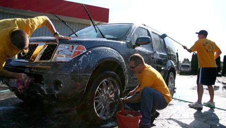 Sailors from Naval Base Kitsap Bangor-based Submarine Development Squadron 5 washed cars Oct. 9 at the Texaco on Silverdale Way to raise money for Toys for Tots. As of 1 p.m.