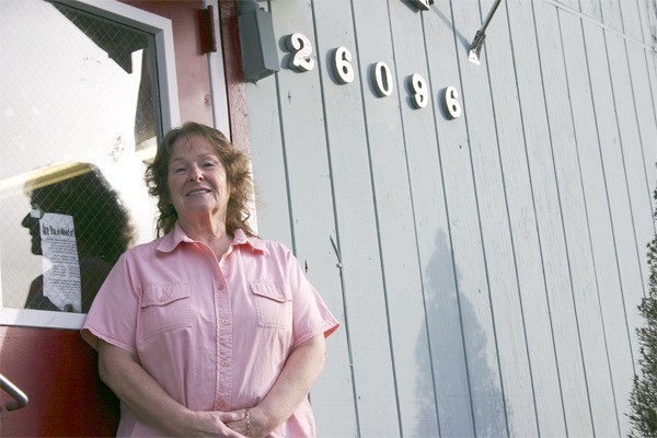 Barb Fulton stands in front of Kingston’s VFW Post 7329 where she runs the Kingston Food Bank. Fulton’s father built the structure originally to house ambulances about 50 years ago.