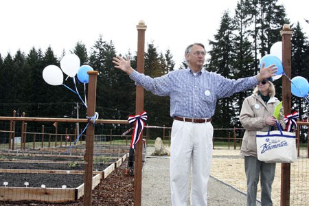 Port of  Bremerton CEO Cary Bozeman shows visitors the p-patches the agency contructed on port property as an added amenity it hopes will entice businesses to relocate to the industrial park.