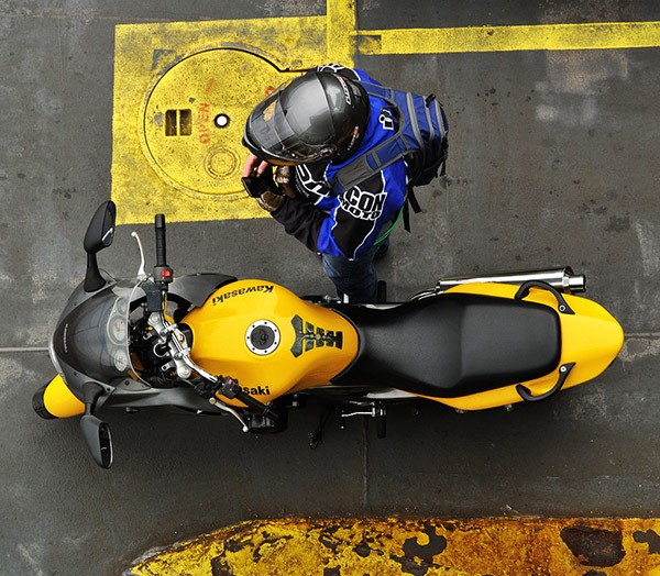 A motorcyclist checks a smartphone while on the ferry MV Cathlamet earlier this year.