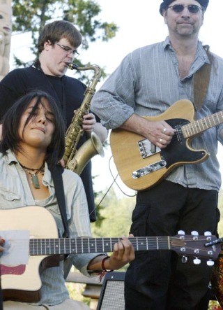 Vicci Martinez (front) w/ bandmate Rod Cook (right) and special guest Bremerton's Brett Cummings on saxophone at the Clearwater Thursday night.