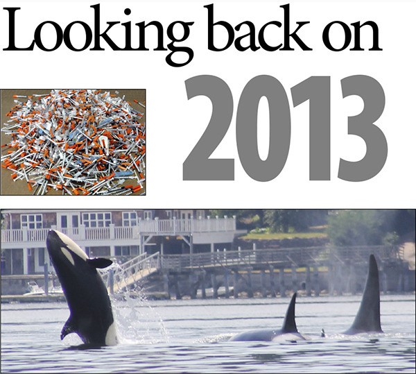 Top: The Poulsbo Police Department stepped up efforts to curb heroin use in the city. Above: An orca pod visited Liberty Bay in July.