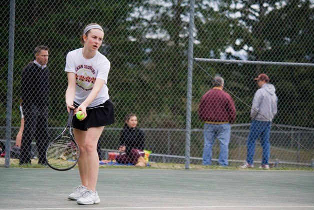 Central Kitsap’s Dana Jensen prepares to serve to Kailyn Skjonsby. Skjonsby won the match 6-0