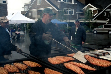 Volunteer cooks keep the salmon coming at the Manchester Salmon Bake on Sunday.