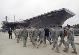 The 4th Battalion of the 160th Special Operations Aviation Regiment out of Fort Lewis visited the USS Kitty Hawk Thursday. The group launched the first ground combat operation in Afghanistan by flying off the warship less than a month after the 9/11 terrorist attacks in 2001.