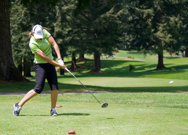 Klahowya golfer McKenna Kendall tees off on the ninth hole at Gold Mountain for the district tournament on Tuesday. Kendall placed 11th out of 21 girls in the 2A division.