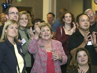 State House 23rd District Position #1 nominee Sherry Appleton pumps her fist after seeing the results come in at 8:15 p.m. during the democratic election party held at the Silverdale Beach Hotel in Silverdale.