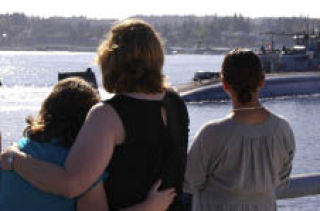 Family members gather together as they watch the USS Connecticut (SSN 22) depart Naval Base Kitsap-Bremerton for a regularly scheduled six-month deployment Sept. 10. This will be Connecticut’s first deployment since shifting its homeport to Bremerton in January 2008.