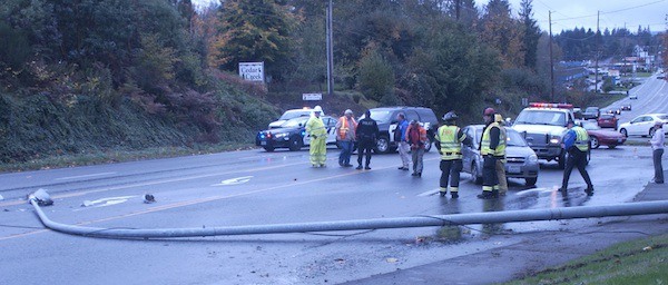 Port Orchard police and South Kitsap Fire and Rescue emergency personnel responded to an accident involving two vehicles after a street light was blown over on Mile Hill Drive because of strong winds.