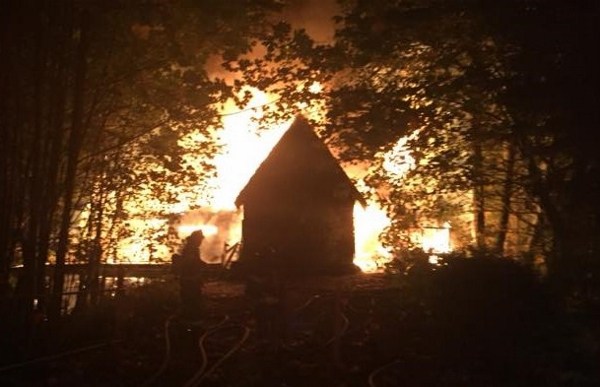 No one was injured in a fast-moving fire that destroyed a home in Poulsbo early Oct. 17.