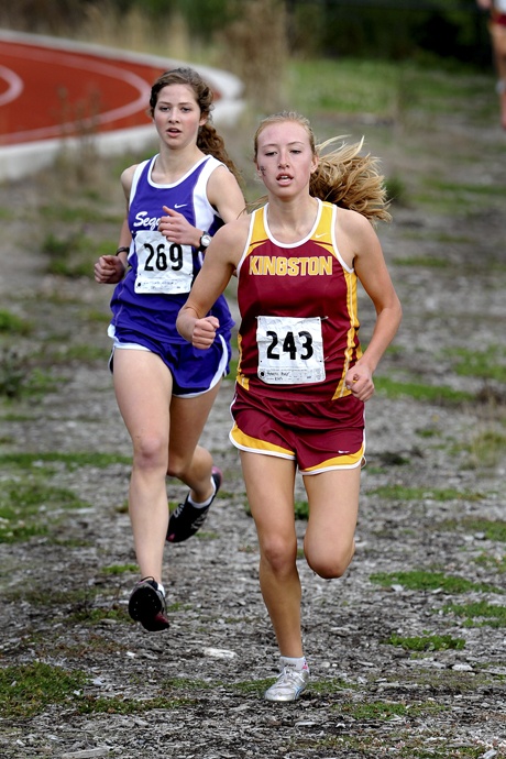 Kingston High's Ruby Roberts moves to the front of the pack Wednesday at a cross country meet in Kingston.