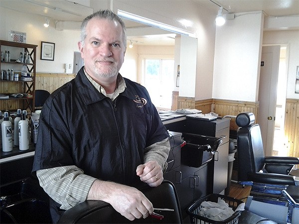 Gene Bryant is the owner of Bayside Barber Shop