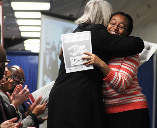 TyAmber White embraces Judge Robin White after introducing her as mistress of ceremonies