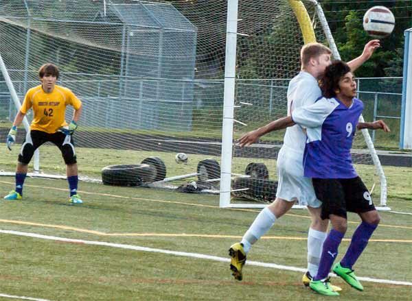 North Kitsap’s Jared Roest battles with Sequim offense