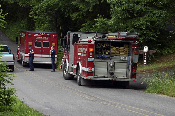 North Kitsap Fire & Rescue vehicles block the entrance to Soaring Eagle Place in Suquamish after the apparent accidental death of a 61-year-old man