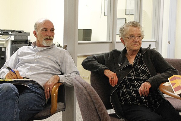 Robert Parker and Karen Best listen to a viewpoint at a meeting of the Bremerton Patriot/Central Kitsap Reporter Community Advisory Board