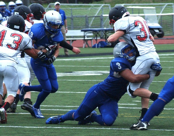 Olympic High School beat the Yelm Tornadoes in a non-league game last Friday night at Silverdale Stadium. The game’s lone touchdown came from Olympic’s Michael Halverson who picked up  a loose ball and ran it 65 yards to the end zone.