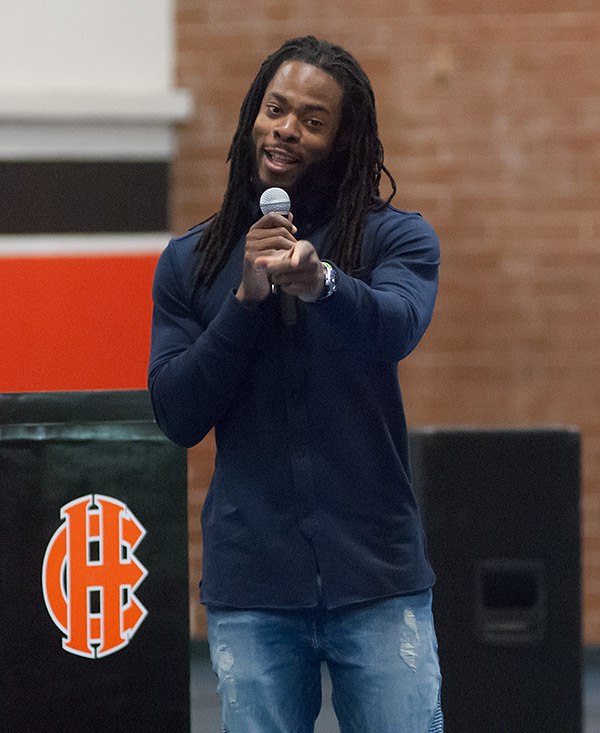 Seahawks cornerback Richard Sherman speaks at Cedar Heights Junior High School on May 7.