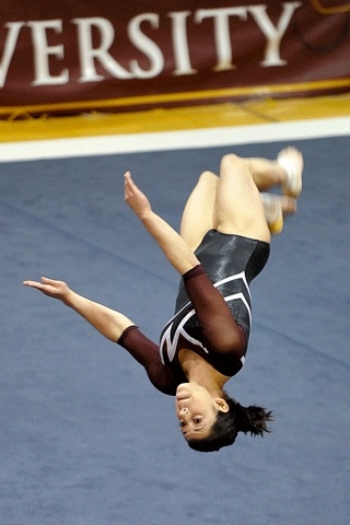 Olympic Gymnastics Center team member Katie Baretela rotates on a move during the Level 7-10 Washington State Championships at Seattle Pacific University March 28. Baretela qualified for the regional meet in Montana with an all-around score of 35.45.