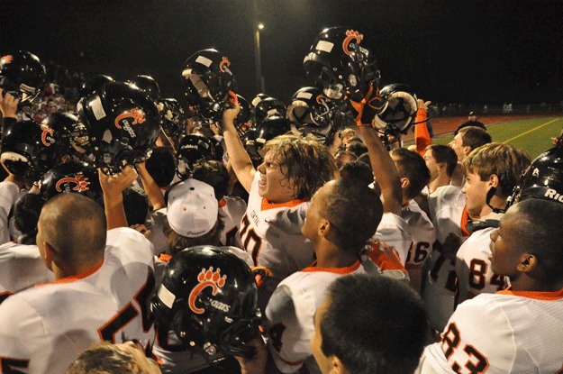 The Central Kitsap High School football team celebrates following a 35-0 win over Olympic High School in the Battle of Bucklin Hill Friday at Silverdale Stadium.