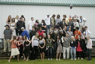 The Central Kitsap Alternative School graduating class enjoyed a moment goofing off for their class picture after Friday's graduation ceremony.