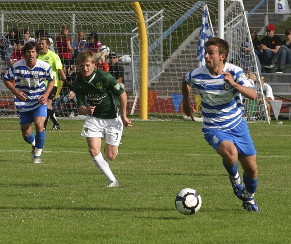 Kitsap Pumas midfielder David Gray dribbles the ball upfield Sunday against the Portland Timbers U23 team. The Pumas (11-2-2) defeated the Vancouver Whitecaps Wednesday