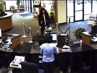 A man wearing a wig robbed Kitsap Credit Union Monday morning.