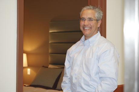 Ed Grandbois shows a bedroom in the newly opened Kitsap Pulmonary & Sleep Medicine.