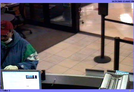 Police are looking for this man who robbed Chase Bank inside Fred Meyer in East Bremerton Thursday. The bank's video surveillance system captured several images of the suspect.