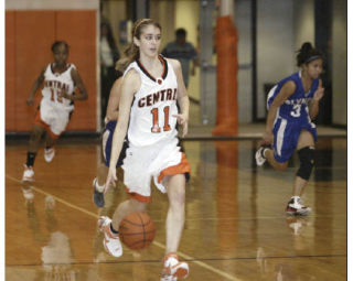 Central Kitsap’s Amanda Evans brings the ball up the floor during a 2007-08 game against Olympic. Evans