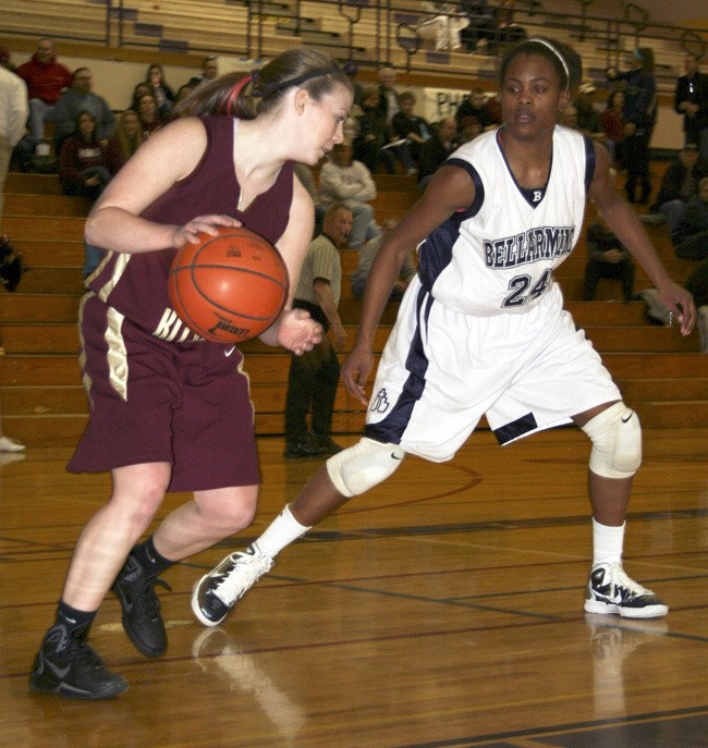 South Kitsap’s Kelsey Callaghan pressed by Bellaramine’s Sarah Hartwell in the Wolves' season-ending loss on Saturday in Puyallup