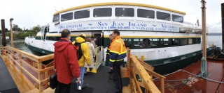 Commuters load onto a Lofall dock foot ferry on their way to the Olympic Peninsula. The ferries run from 4 a.m. to 11 p.m. between Lofall and South Point to mitigate the six-week Hood Canal Bridge closure.