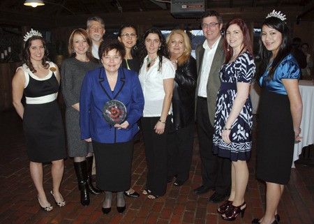 The Silverdale Chamber of Commerce President Angela Sell received the 2011 Kitsap Peninsula Visitor and Convention Bureau community partnership award in Poulsbo March 24. From the left: Natasha Tucker