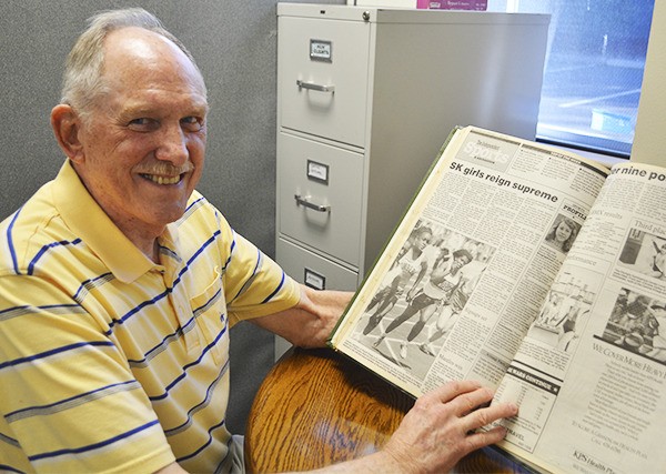 Longtime South Kitsap girls track coach looks through the Independent’s archives for articles about his state championship teams in the early 1990s.