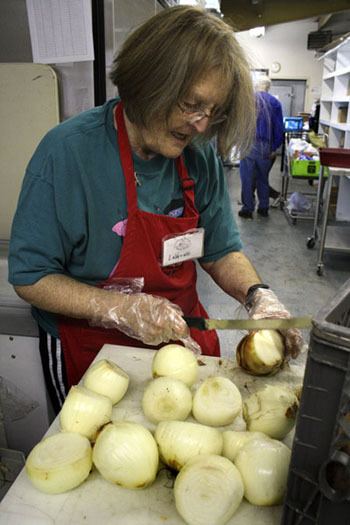 LaVerne Truman volunteers at the Central Kitsap Food Bank Monday.