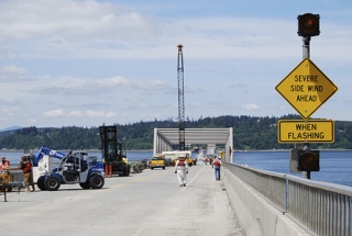 Crews walk the eastern portion of the Hood Canal Bridge May 27.