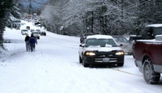 South Kitsap motorists were taking a big risk on Thursday trying to climb the snow-covered Mile Hill Drive.