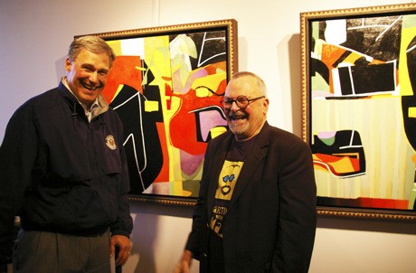 Artist Max Hayslette shares a laugh with U.S. Rep. Jay Inslee at his public art opening at Roby King Galleries on Bainbridge Island last week. The show runs there through the month of June. For more information