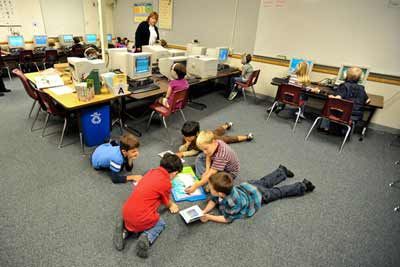 Students at Wolfle Elementary catch up on their reading in the computer lab on Sept. 30.