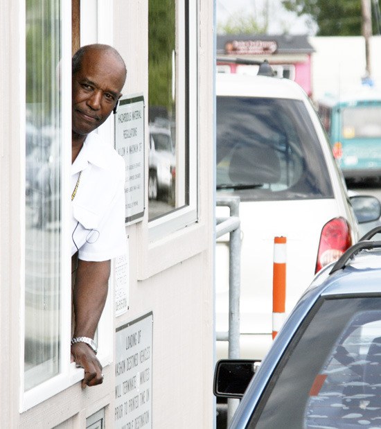 WSF’s Don Clark greets passengers from the ferry ticket booth.