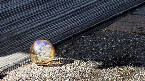 The glass ball that allegedly caught nearby napkins on fire inside Saisons boutique in Poulsbo Aug. 1 was pulled from the business as crews from the Poulsbo police and fire departments investigated the fire.