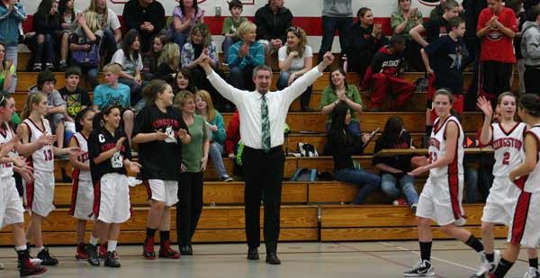 John Goar and the Kingston Cavaliers celebrate after winning a championship Thursday.