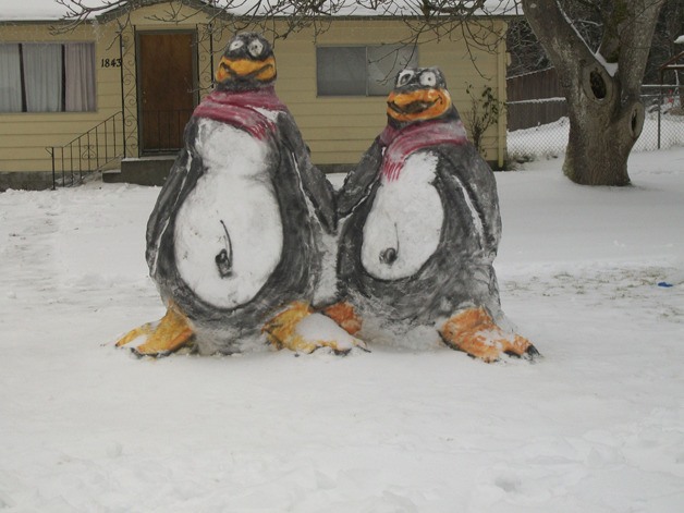 These two penguins were created in front of a house on Karcher Road.