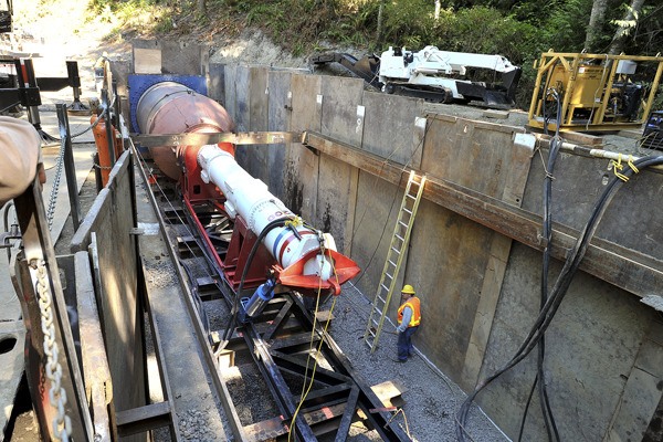 Crews used a massive drill to burrow beneath State Route 305 in August.