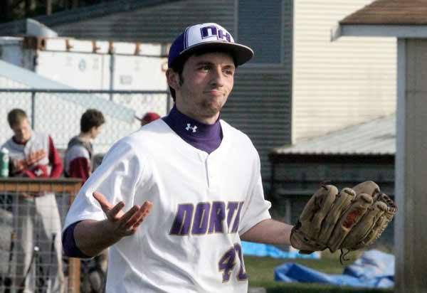 North Kitsap's Ben Tamm shrugs after three Kingston batters strike out in a row during the rivalry baseball game March 25 at North Kitsap High School.