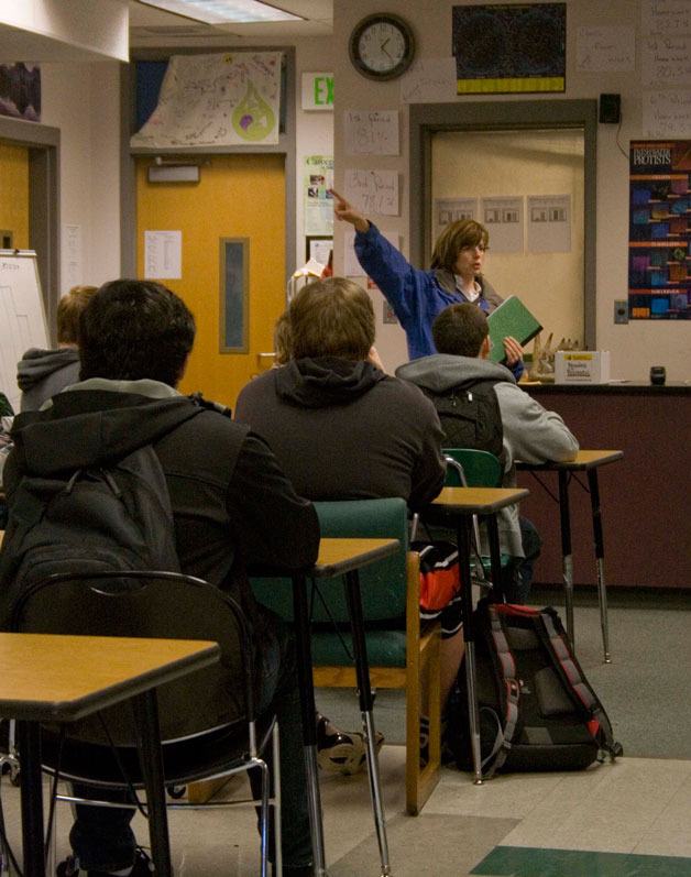 Environmental Science teacher Julie Turk addresses students before the group leaves for a hike in the Newberry Hill Heritage Park on Friday.