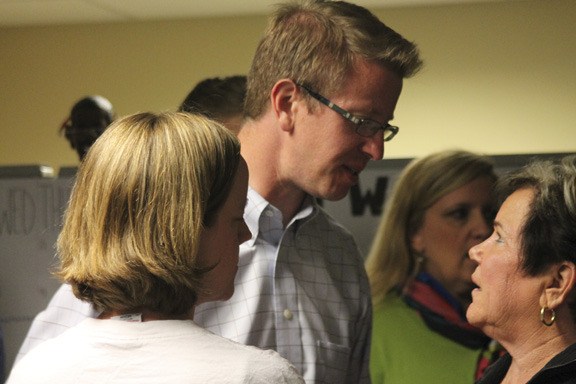 Derek Kilmer and supporters track election results Tuesday night at the Democratic Party headquarters in Silverdale.