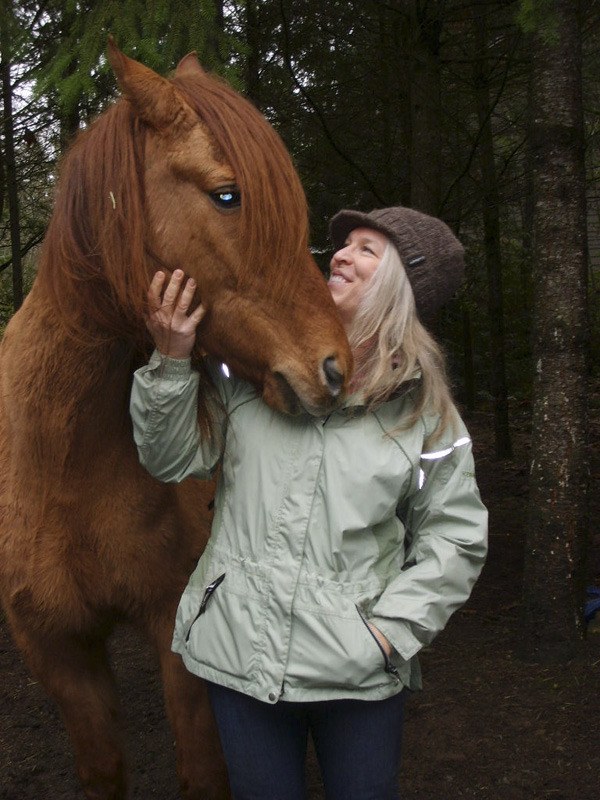 Drea Bergquist-Bowen and Annie in the older wooden barn. ‘Horses don’t care who you are