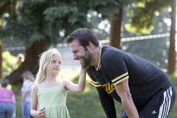 Mira McCurdy congratulates her father